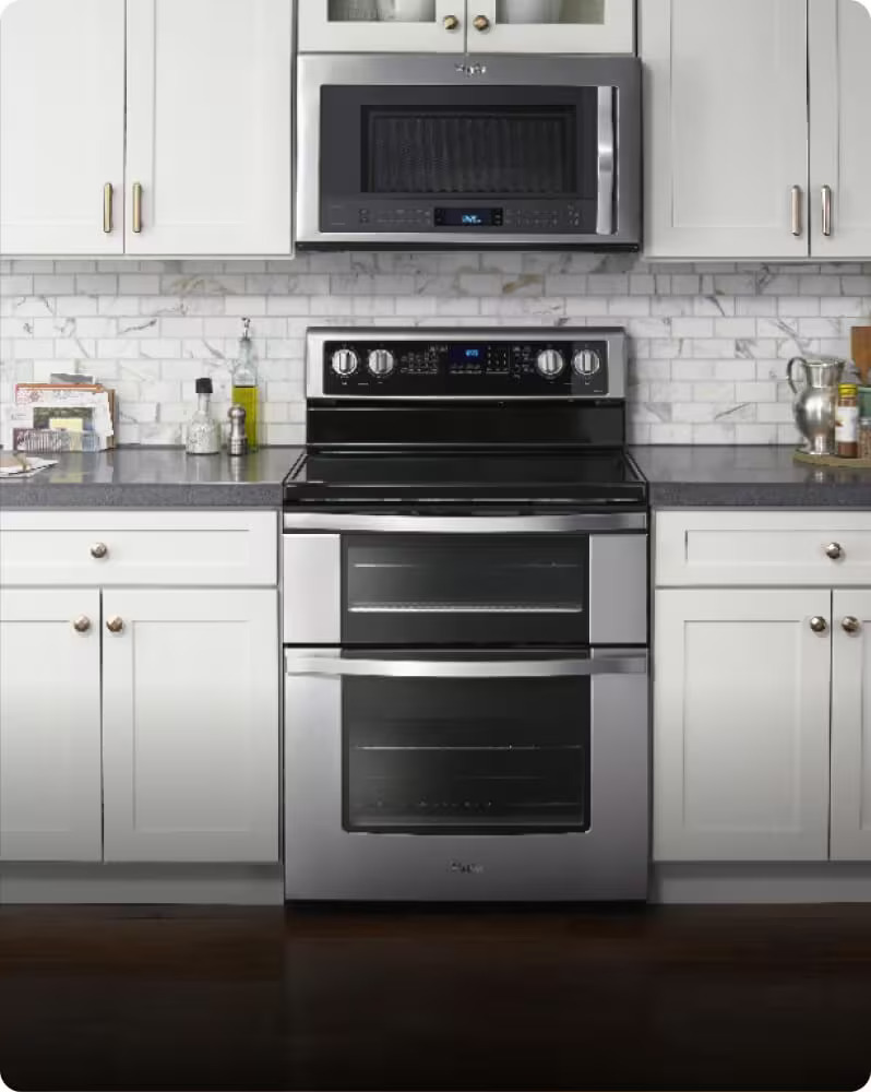 Black oven with an electric stovetop at Don's Plumbing and Appliance Showroom